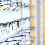 In,Optician,Shop-,Glasses,For,Sale,In,Wall,Rack