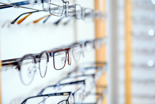 In,Optician,Shop-,Glasses,For,Sale,In,Wall,Rack