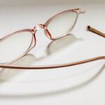 Close,Up,A,Pair,Of,Broken,Eyeglasses,Is,Displayed,On