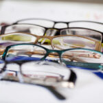 Closeup,Of,New,Glasses,Displayed,On,Paper