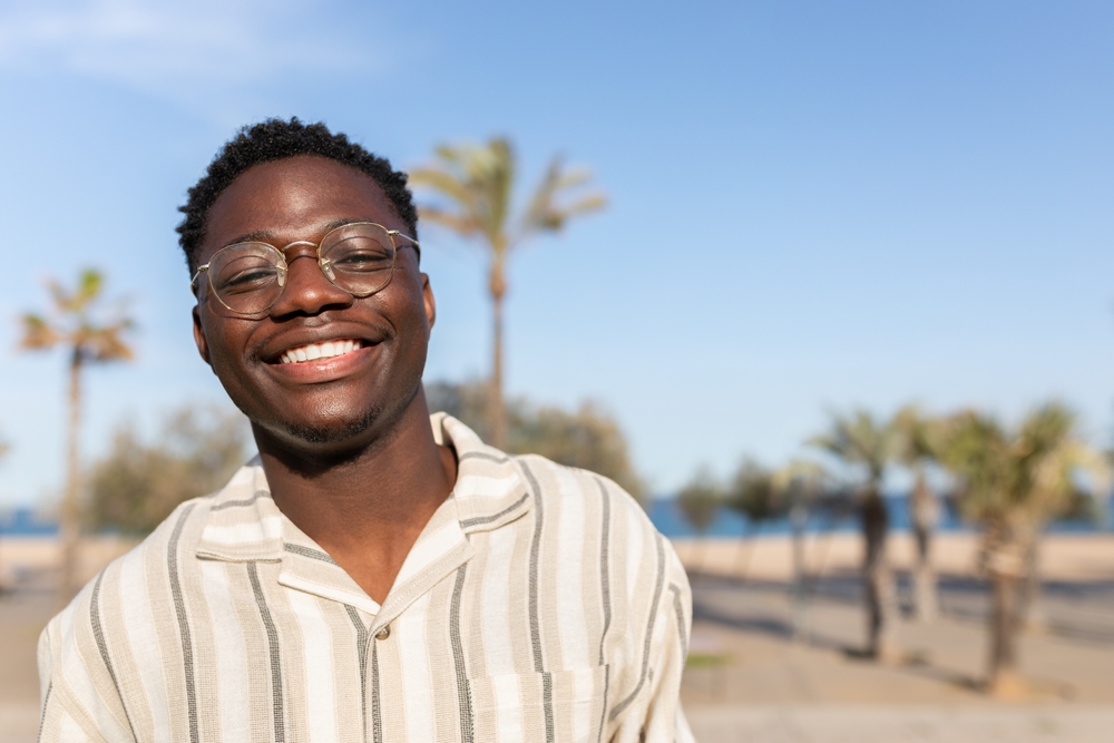 Portrait,Of,Young,Happy,And,Smiling,Black,Man,Wearing,Glasses